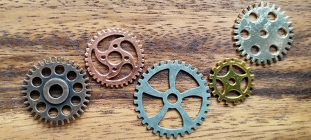 Mechanical gears arrangement workshop table macro photography industrial environment close-up view engineering conceptの写真素材