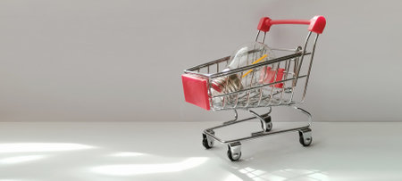 Shopping cart with product indoor store showcase minimalist space eye-level view consumerism conceptの写真素材