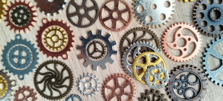 Industrial gears in close-up workshop photography textured background top-down view mechanical artistryの写真素材