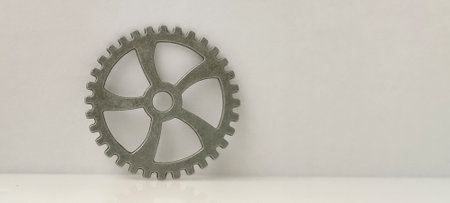 Industrial gear mechanism workshop metal component minimalist design side view engineering conceptの写真素材