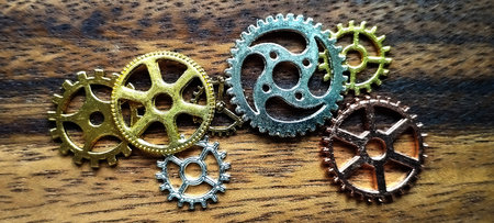 Mechanical engineering concepts workshop gear assemblies industrial setting close-up view gear...