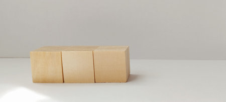 Building creativity minimalist blocks on white surface modern aesthetic calm environment abstract viewpointの写真素材