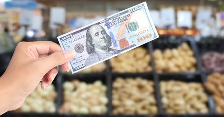 American Dollars Cash Money 100 dollars banknotes in hand Business Concepts, Business Approaches and Success in Finance, Banking and Investmentの写真素材