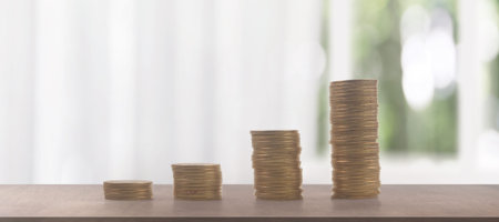 Stack of coin with trading graph, financial investment conceptの写真素材