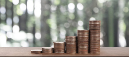Stack of coin with trading graph, financial investment concept