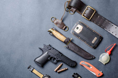 Male survival kit top view close-up on a dark backgroundの写真素材