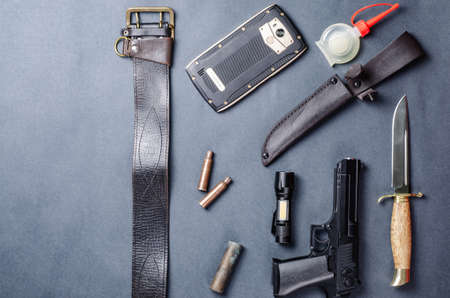 Male survival kit top view close-up on a dark backgroundの写真素材