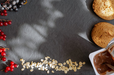 Oatmeal cookies on a dark background top view flat lay