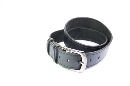 black men's leather belt handmade white background close upの写真素材