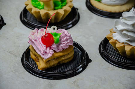 sweet cakes on a light backgroundの写真素材