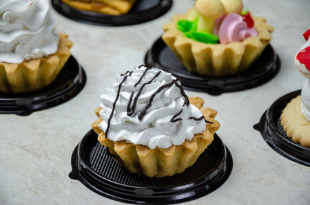 sweet cakes on a light background