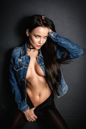 Perfect young girl in a sexy tighs fashion styleの写真素材