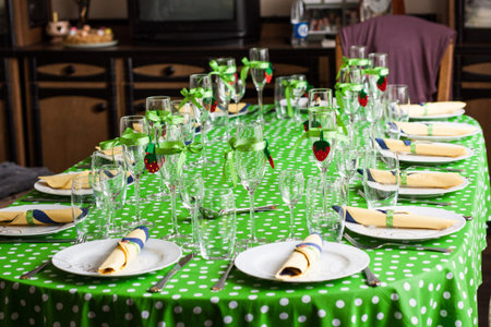 Festively decorated table in anticipation of the holiday and peopleの写真素材