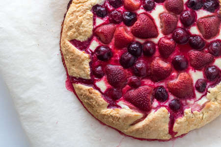 Berry Tart. Galette with summer berries. Pie with strawberry and cherryの写真素材