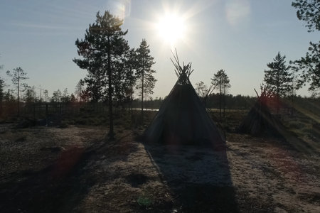 Yurt resident of the forest tundra and tundra. Yurt against the background of the forest and sunset.の写真素材