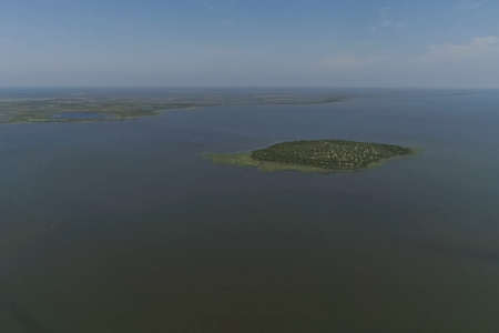 View from above on the coastal forest tundra. River and islands with taiga.の写真素材