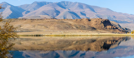 Lake in the Altai Mountains. Panorama of the Altai landscape in the mountains. The time of year is autumn.の写真素材
