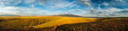 Mountains and hills altai in autumn, panoramic photo. Mountains and hills altai in autumn, panoramic...