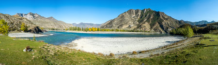 Panorama is the Altai, a mountain river flowing between the Altai mountains and the nature of the area.の写真素材