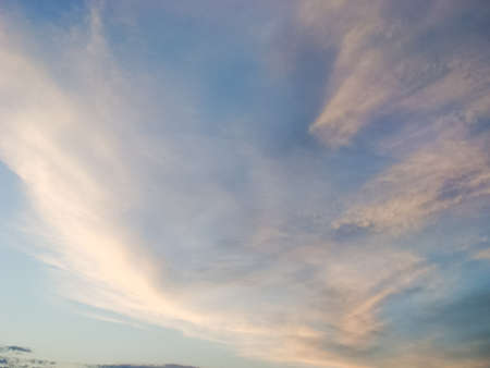 The sky with the clouds at sunset. The light of the sunset on the clouds. sky in the evening.の写真素材