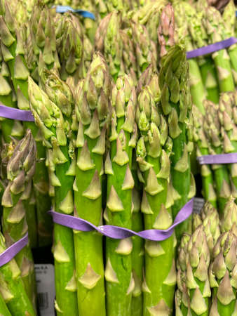 Fresh asparagus in a bunch for sale.の写真素材