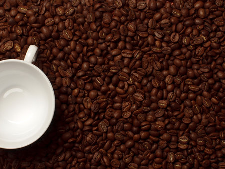 White cup on coffee beans.