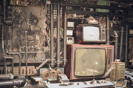 Old TV, chips and various partsの写真素材