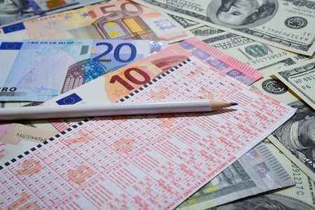 Win the lottery.On lottery ticket in Ukrainian written instructions on filling: options results; double result; handicap first team, second team handicap; more than a given number; less than a given numberの写真素材