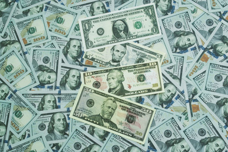 US dollars. Lots of banknotes. One hundred, fifteen, ten, five and one dollar denominations