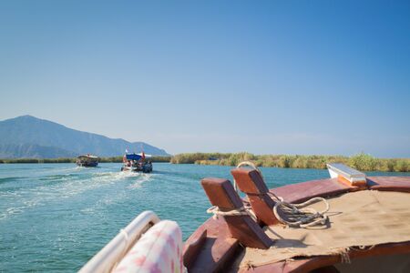Walk on the river Dalyan, Turkey. Dalyan River connects the lake Caj?giz and the Aegean Seaの写真素材