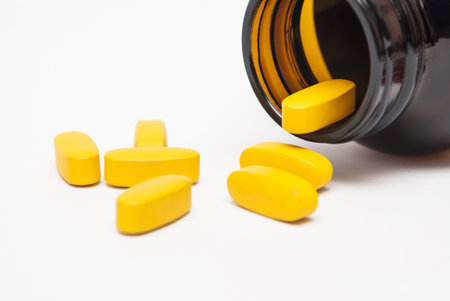 Yellow pills closeup