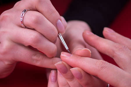 Own business.Manicure in process.macroの写真素材