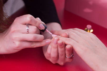Manicure service at home for a clientの写真素材
