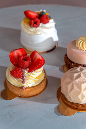 natural cakes with berries, vertical frameの写真素材