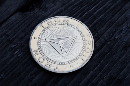 Golden coin Tron TRX, digital money, new cryptocurrency. Tron is a promising cryptocurrency.の写真素材