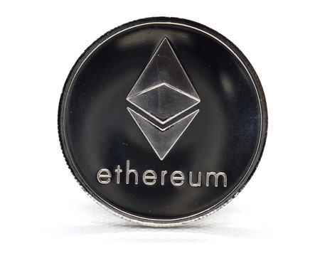 Silver Ethereum (ETH) coin isolated on a white backgroundの写真素材