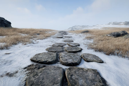 Stone path on the top of a hill in winter with snow.の素材