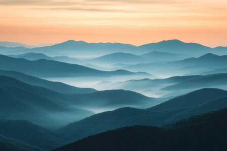 Foggy morning in the mountains. Landscape with mountains and skyの素材