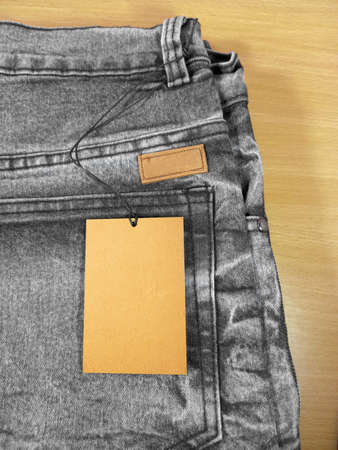 Tag price and leather label on jeansの写真素材