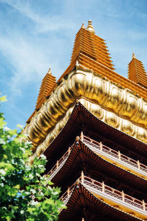 Asian temple dome. Old building on the sky background.の写真素材