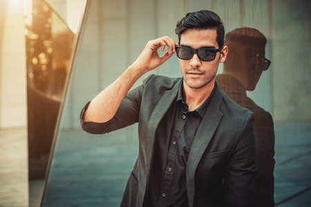 Man businessman posing in modern architectural environmentの写真素材