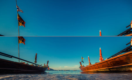 Longtale boat at the Thai beach. Paradice sand beach place. Boats on the clear water and blue...