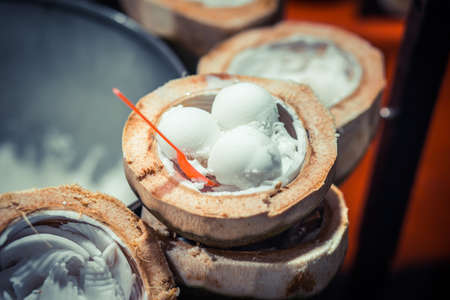 Coconut ice cream in coco shells. Natural desert.の写真素材