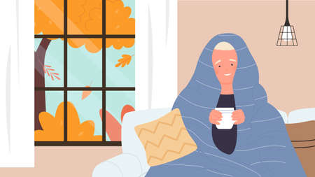 Hot tea or chocolate cup for cute kid vector illustration. Cartoon boy child character holding hot tea drink, sitting under cozy blanket in comfort home room by window with autumn landscape backgroundのイラスト素材