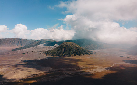 Landscape view of bromo volcano with cloudy sky. Misty bromo tengger Semeru National Parkの写真素材
