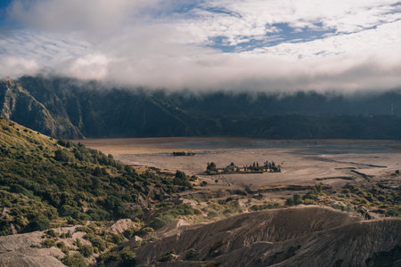 Majestic landscape view of foggy Mount Bromo volcano. Morning mist in Semeru National Parkの写真素材