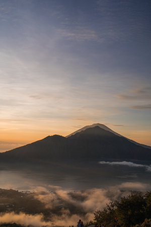 Beautiful sunrise photo of mountain volcano Batur. Exploring famous mount batur and dawn trekkingの写真素材