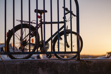 Bike parking at sunset pier of Biograd na Moru port in Croatia, summer vacation transportの写真素材