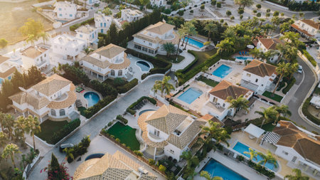 Drone aerial view to residential area with luxury cottages, houses in Aya Napa, Cyprusの写真素材