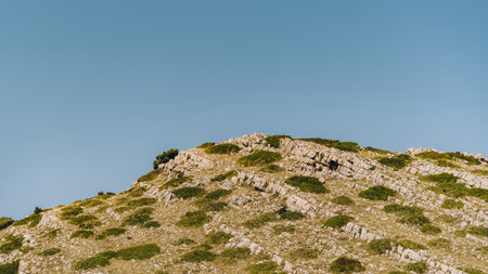 Rugged hill with rows of rocks in Dugi Otok island, Telascica Nature Park in Croatiaの写真素材